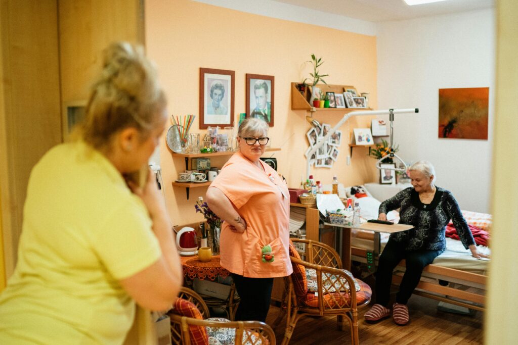 caregiver and resident in a senior living community